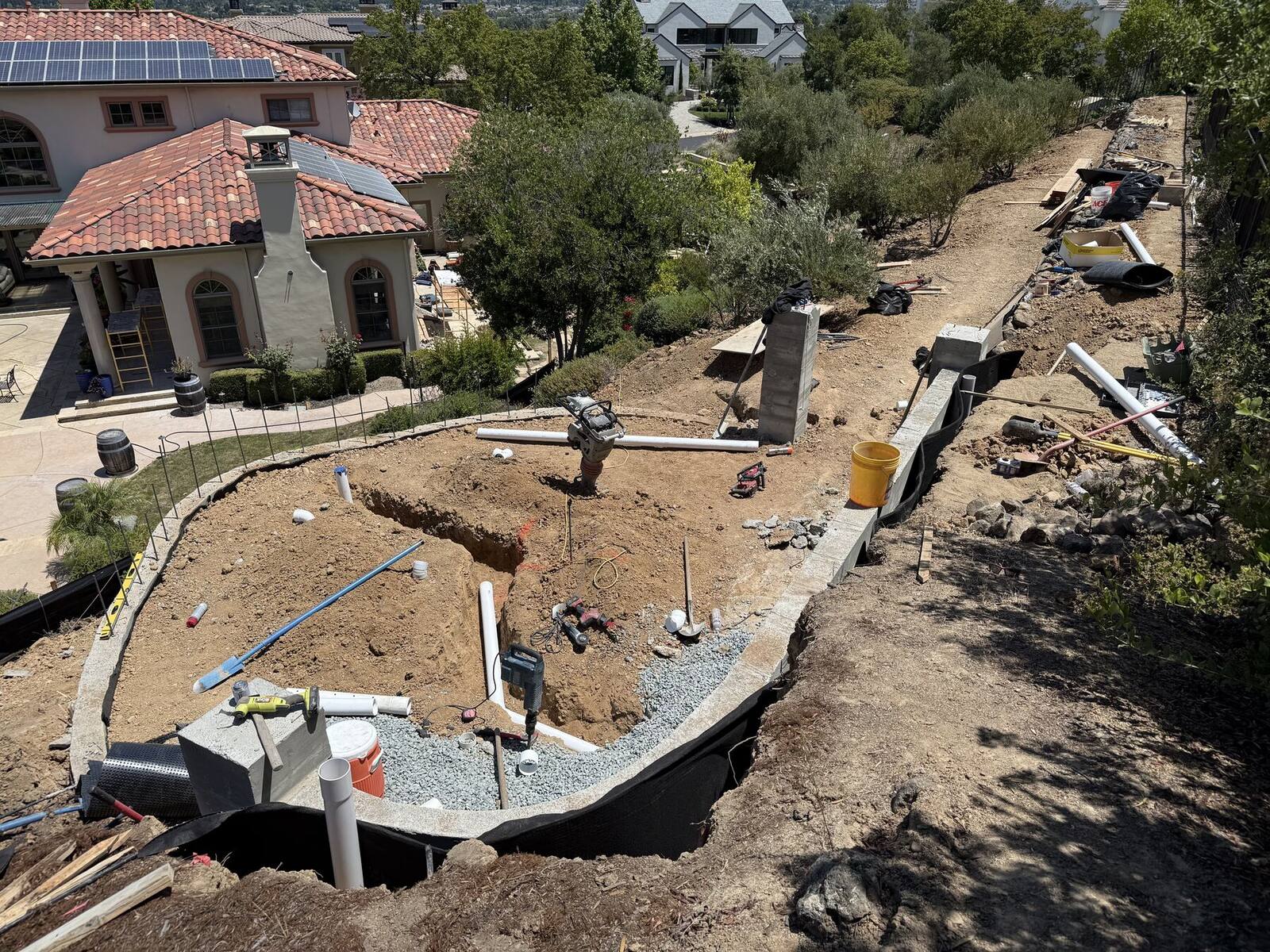 The first curved foundations establishing the new hillside sequence.
