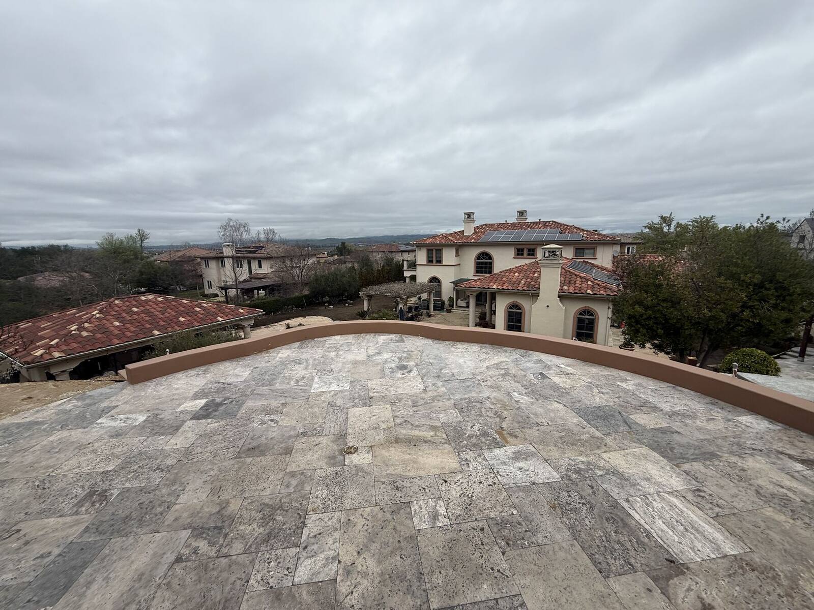 Stone paving completing the upper panorama terrace.